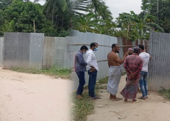 বন্দরে টিনের বেড়া দিয়ে রাস্তা দখল,ভোগান্তিতে এলাকাবাসী